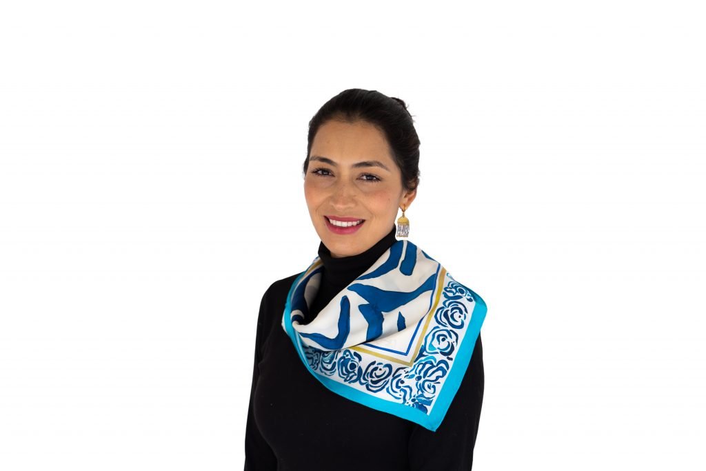 woman wearing blue floral silk scarf