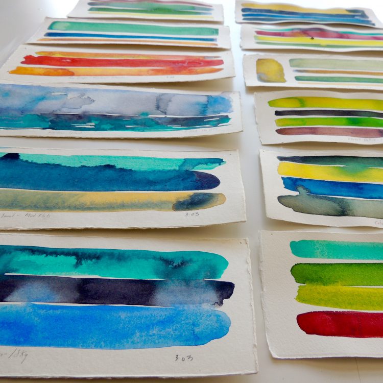 Many small watercolor paintings of color swatches.